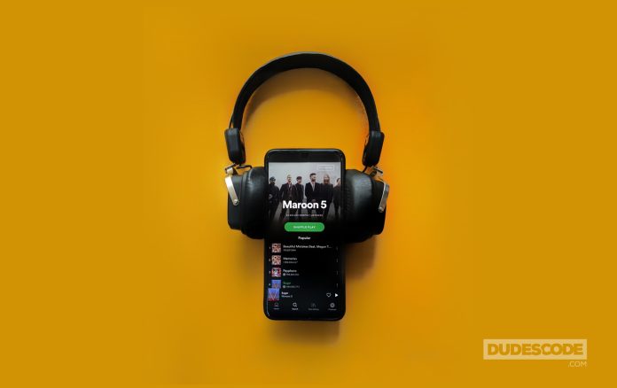 Spotify on yellow background